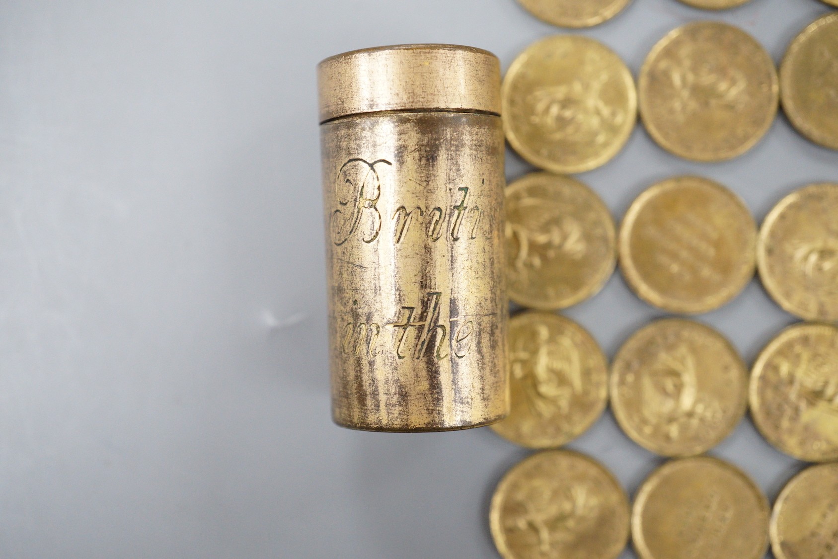‘Marquis of Wellington’ British Victories in the Peninsular Campaign cylindrical brass box by Thomason & Jones, containing 23 gilt medallions depicting Winged Victory and the date of a Peninsular battle